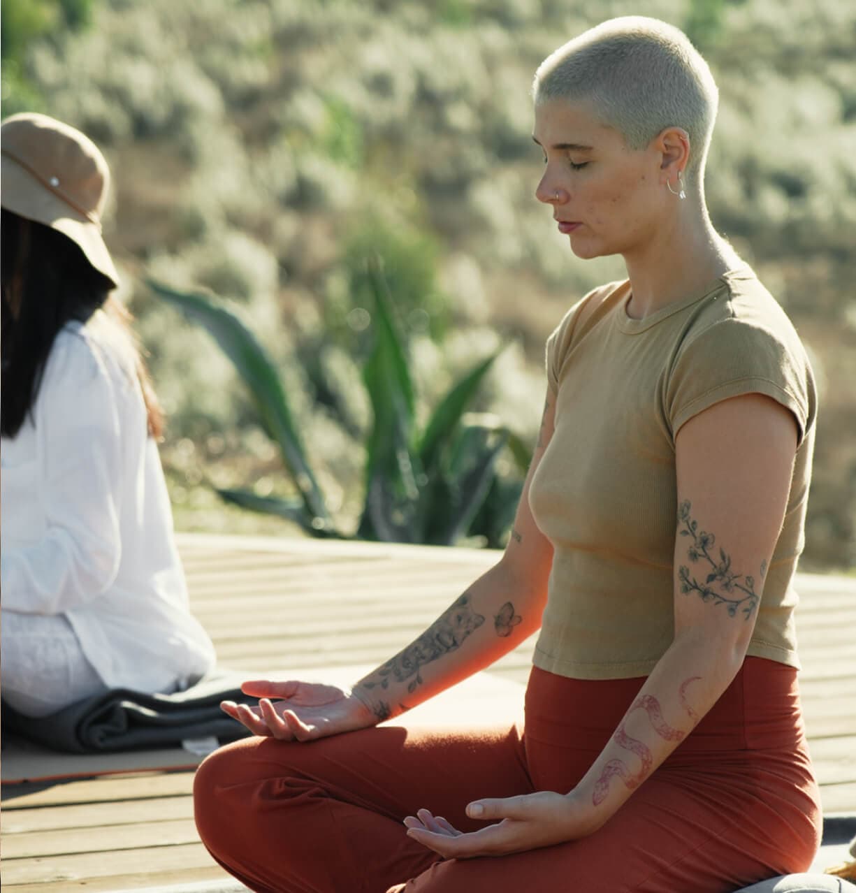 Photo of woman sat mediating