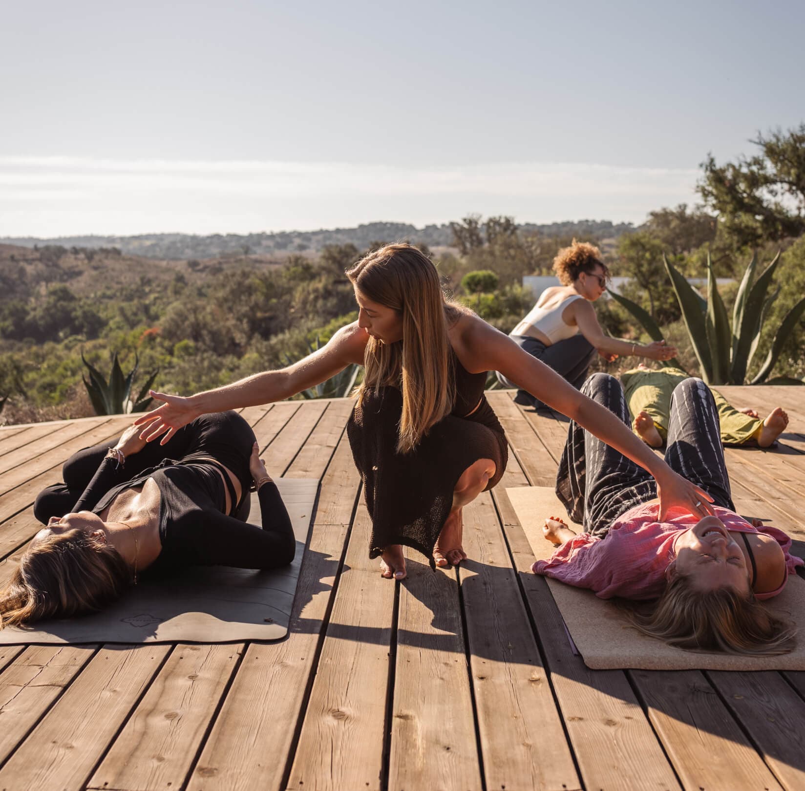 Sophia facilitating Kundalini with two women